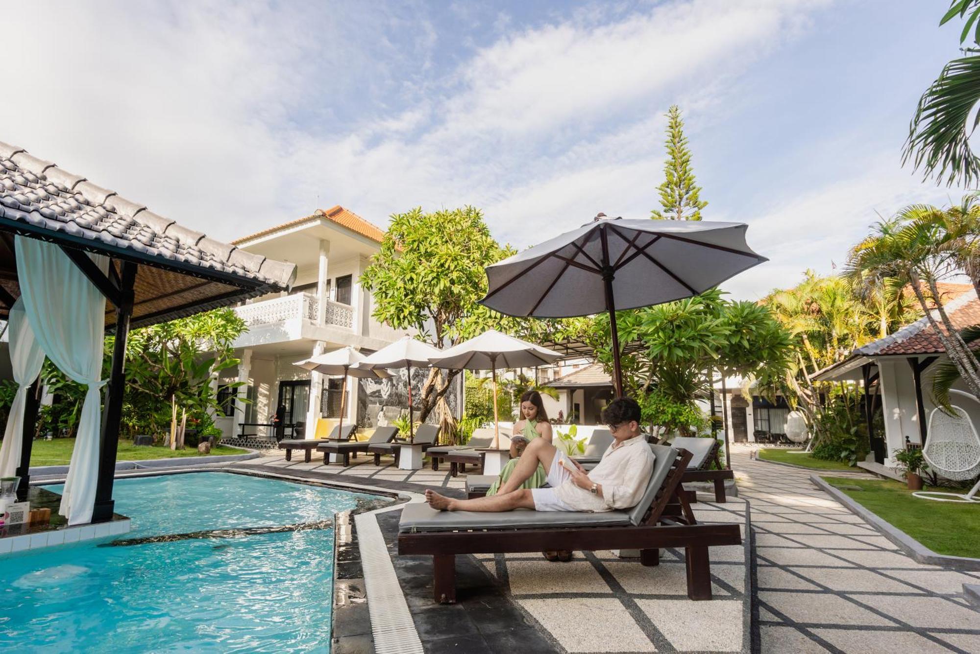 Casa Wina Kuta Hotel Кута Екстериор снимка