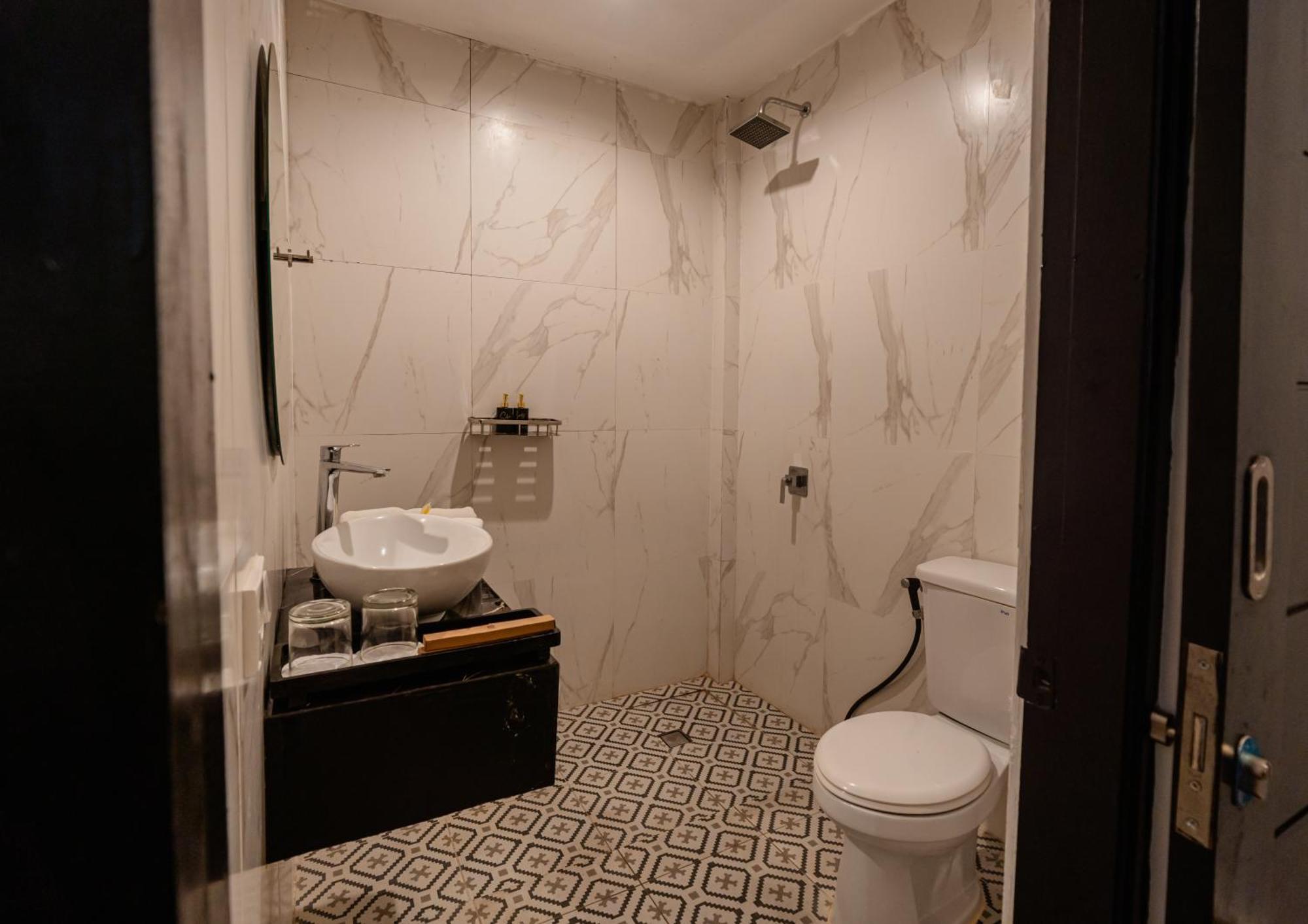 Casa Wina Kuta Hotel Кута Екстериор снимка
