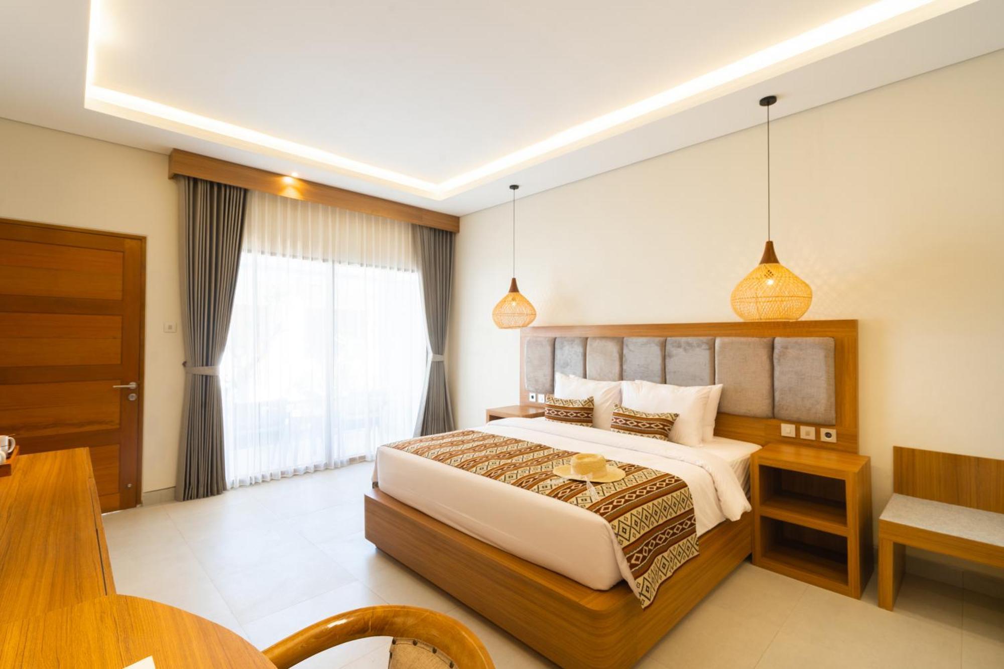Casa Wina Kuta Hotel Кута Екстериор снимка