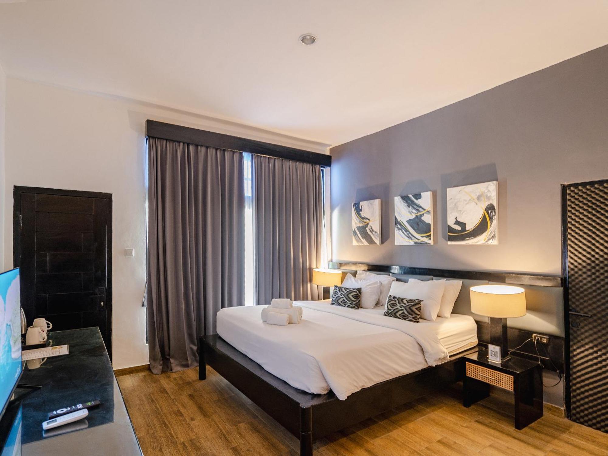 Casa Wina Kuta Hotel Кута Екстериор снимка